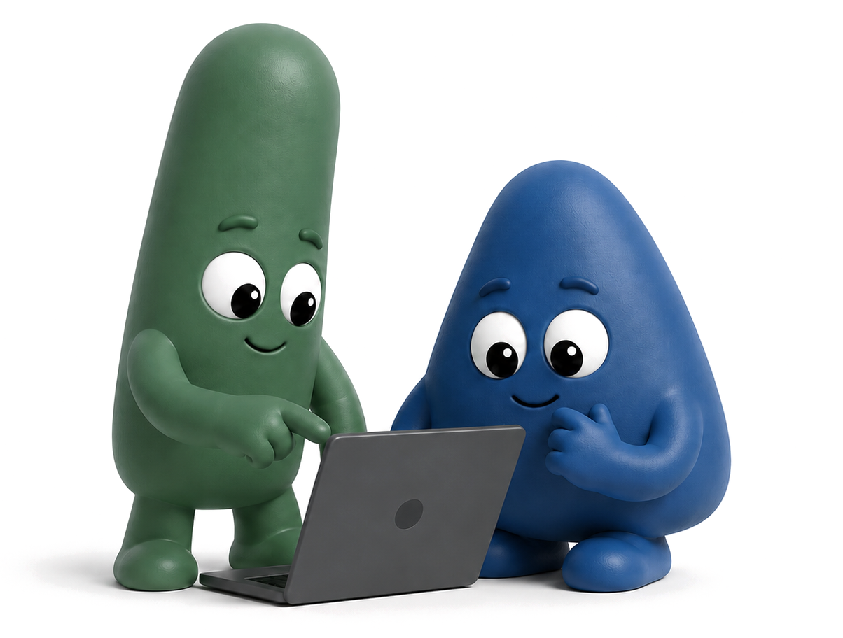 Dos agentes trabajando juntos frente a una laptop.